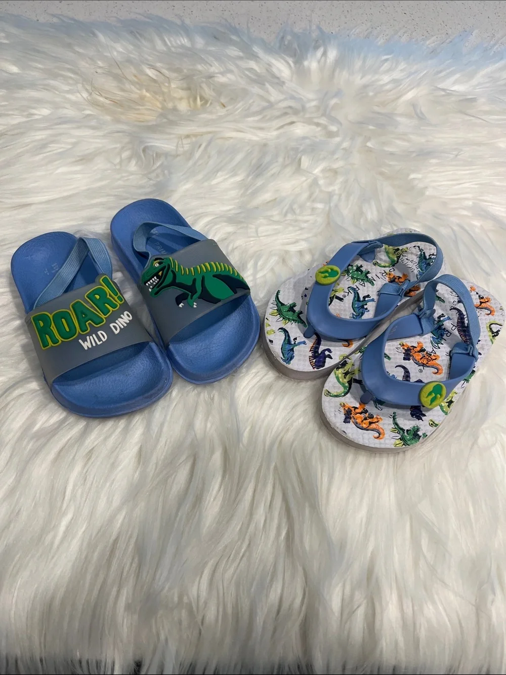 5/$35 2 used pair of Blue Dino Kids Slide Sandals - one is a size 7 & other 5/6